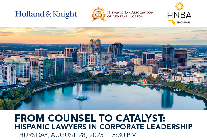 Orlando skyline at sunset with water in front