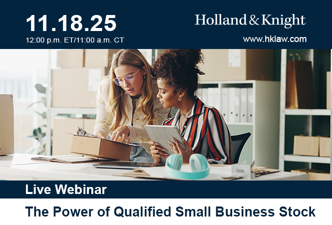 Two people looking at a clipboard and tablet