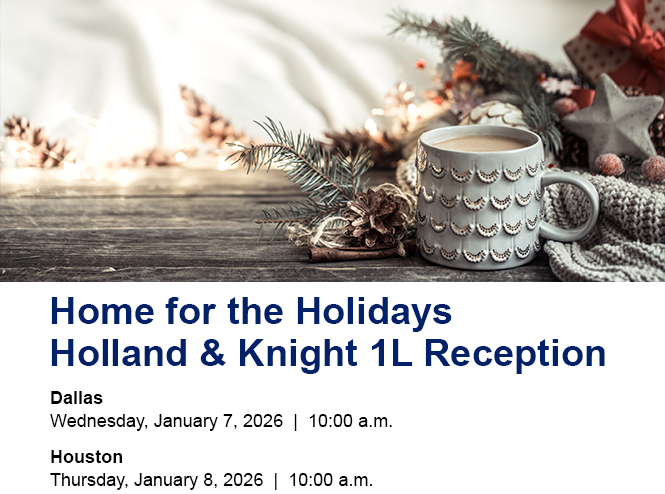 White coffee mug, red star ornaments, green pine needles