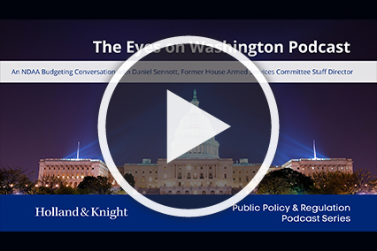 White triangle in circle over White House at night