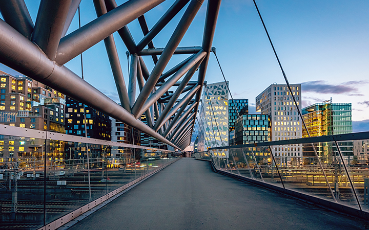 Bridge Walkway by City Skyline