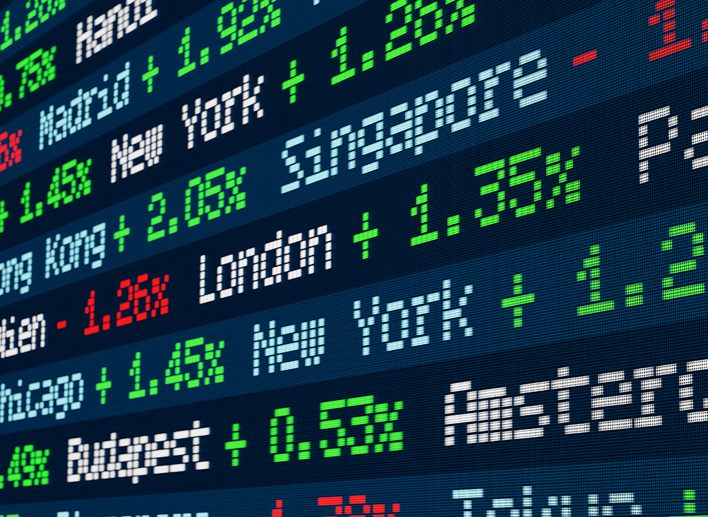 Blue, white, green, and red text on black board