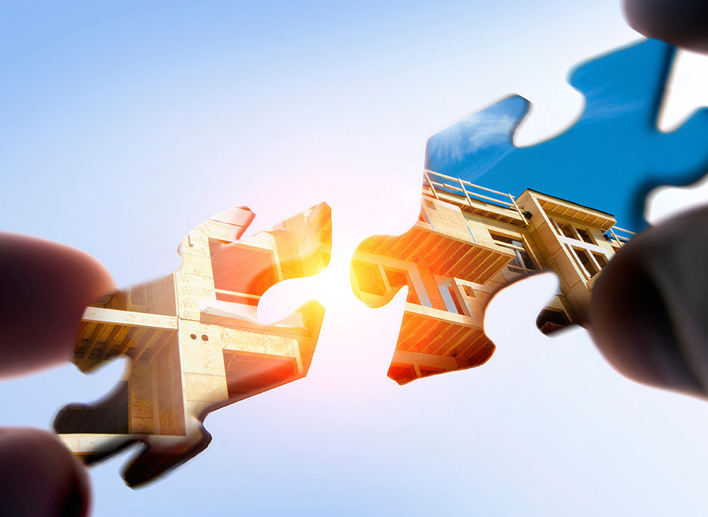 Puzzle pieces with images of apartment building coming together to connect