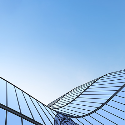 Abstract blue windows of office building