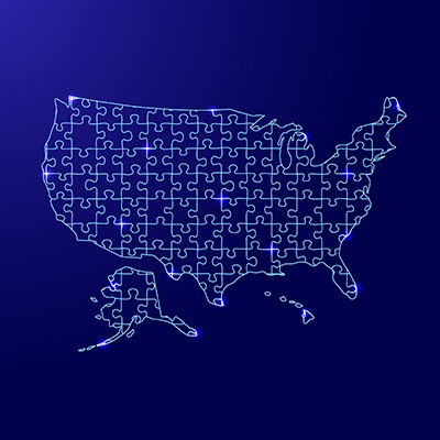 Blue map of United State made out of puzzle pieces
